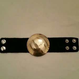 Bracelet with lg gold metal center black suede
